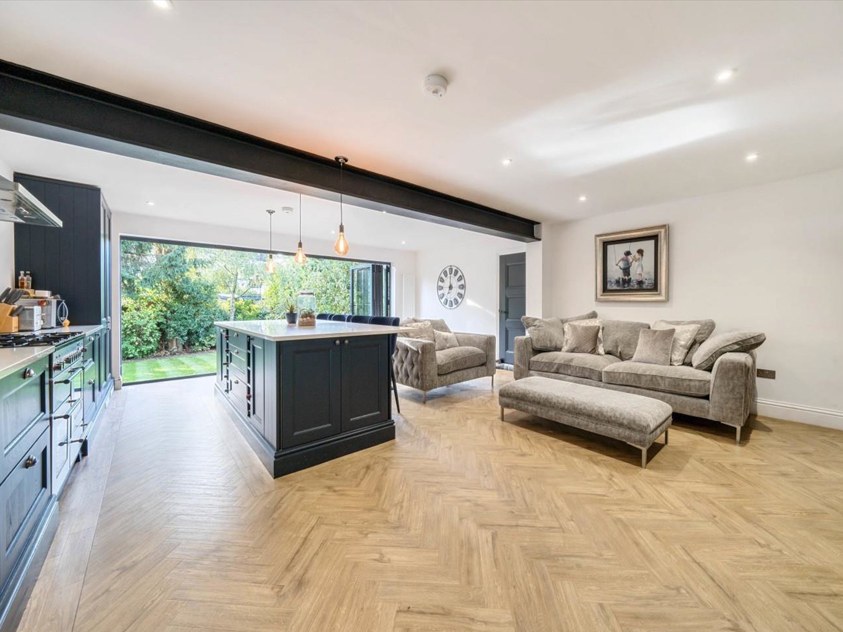 The interior of a single storey rear extension with an open plan kitchen and dining space, built by LD&C Homes